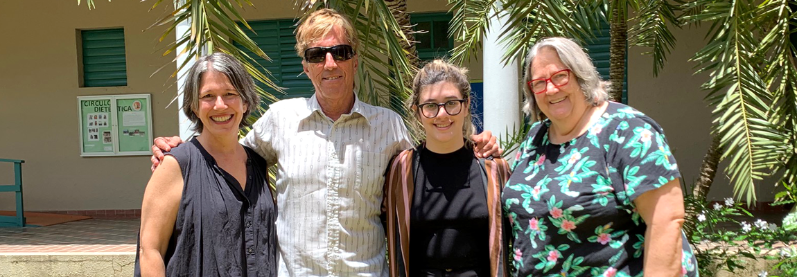 From left to right, Aurora Lauzardo Ugarte, Ph. D., thesis advisor David Auerbach, Ph. D., Jo Ann Santana López, and Prof. H. Jane Barnes.